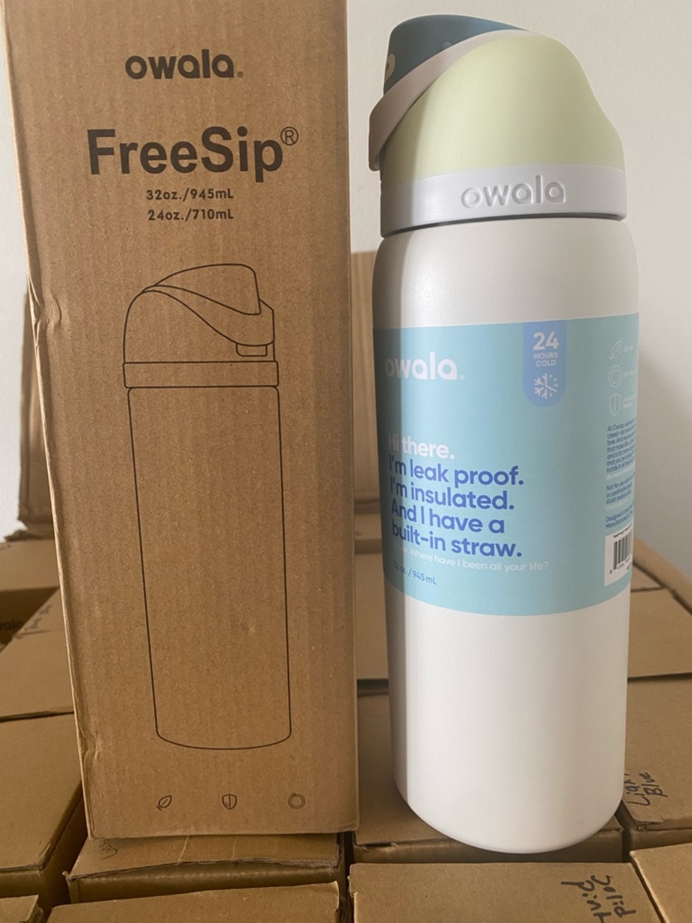 owala FreeSip Insulated Drink Bottle - White with Pastel Blue & Green Accents